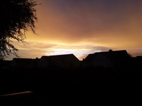 Sky covered in clouds during eclipse in charleston south carolina Stock Photos
