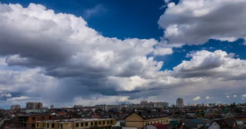 The sky with cumulus clouds flying on a sunny day with strong wind Stock Footage 105790480