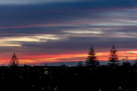 The sky is dark and the sun is setting Stock Photos
