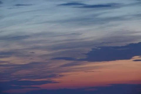 Sky - darker clouds in front of a sunset Foto stock