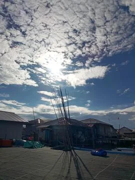 The sky is decorated with clouds. Stock Photos
