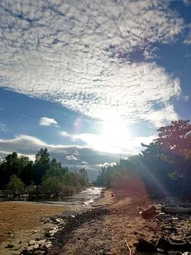 The sky is decorated with clouds. Stock Photos