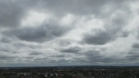 A sky with dense, dramatic clouds above a city landscape. Stock Footage 297971234