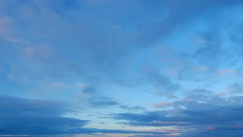 Sky different shades sunset. Dramatic blue, colorful clouds. Sunset sky with Stock Footage 217684808