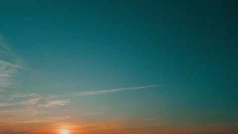 Sky different shades sunset. Dramatic blue, colorful clouds. Sunset sky with Stock Footage 263035407