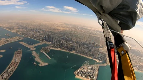 Sky Diver Over The Palm Dubai Stock Footage 101736176