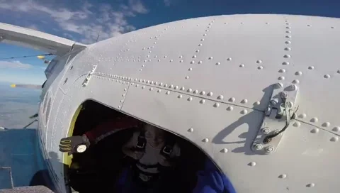 Sky diving experience filmed from the plane Stock Footage 133832034