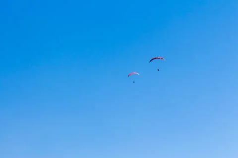 Sky Diving with space in solid blue sky Foto stock