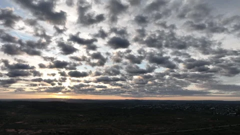 Sky-dominant drone shot over the Broken Hill outback at sunrise, featuring Video stock 342465065