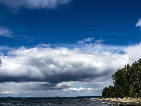 Sky with dramatic white and gray clouds Stock Photos