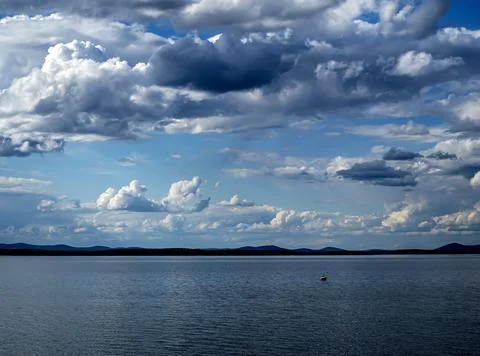 Sky with dramatic white and gray clouds Stock Photos