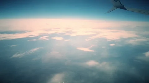 Sky during the day from the window of the plane window. Stock Footage 140935538