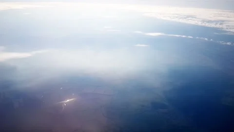 Sky during the day from the window of the plane window. Stock Footage 140935694