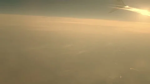 Sky during the day from the window of the plane window. Stock Footage 140935843
