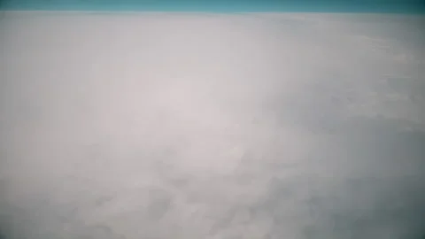 Sky during the day from the window of the plane window. Stock Footage 140936028