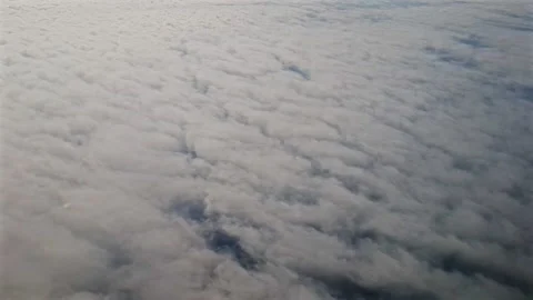 Sky during the day from the window of the plane window. Stock Footage 140936329