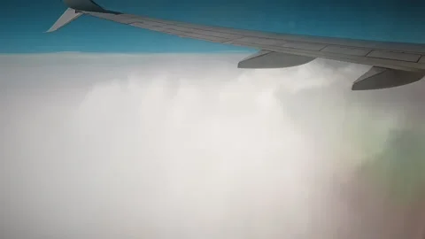 Sky during the day from the window of the plane window. Stock Footage 140936369