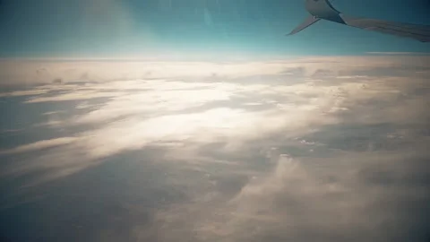 Sky during the day from the window of the plane window. Stock Footage 140936622