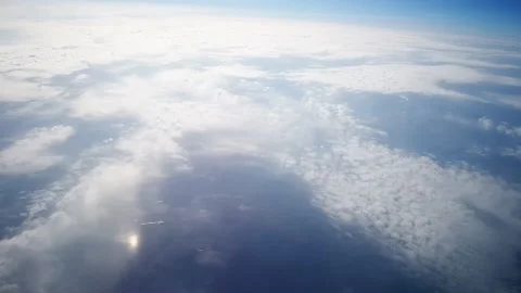 Sky during the day from the window of the plane window. Stock Footage 140936835
