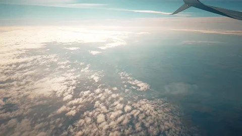 Sky during the day from the window of the plane window. Stock Footage 140938477