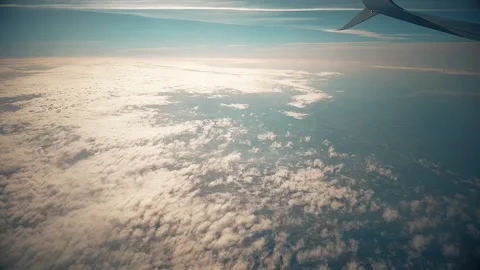 Sky during the day from the window of the plane window. Stock Footage 140938602