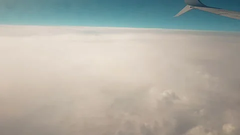 Sky during the day from the window of the plane window. Stock Footage 140938694