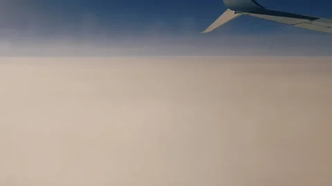Sky during the day from the window of the plane window. Stock Footage 140939195