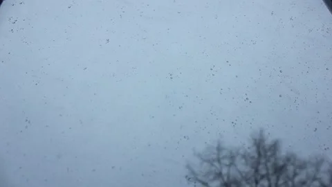 The sky during sudden snowstorm view from the window Stock Footage 123360226