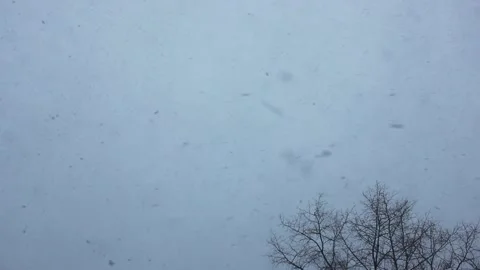 The sky during sudden snowstorm view from the window Stock Footage 123360239