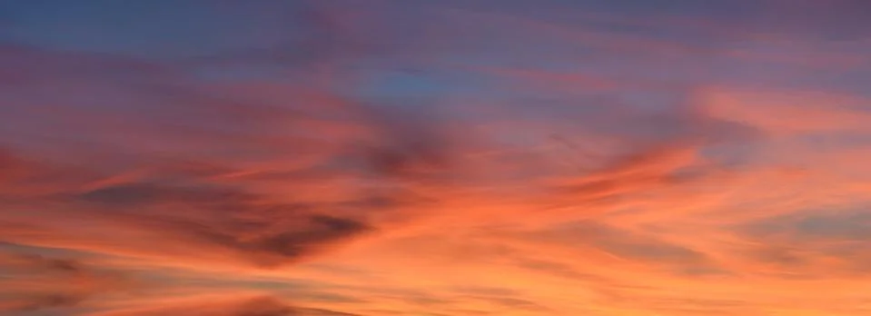 Sky during sunset as a background. Beautiful natural panoramic composition Stock Photos