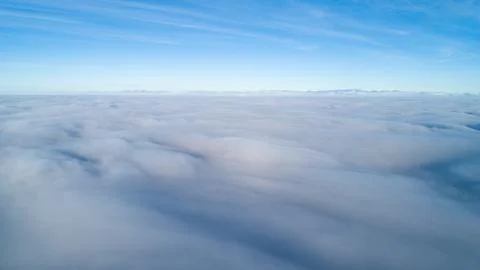 The sky is filled with clouds, creating a moody atmosphere Stock Photos
