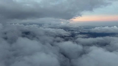 Sky filled with thick, rolling clouds Video stock 345506314