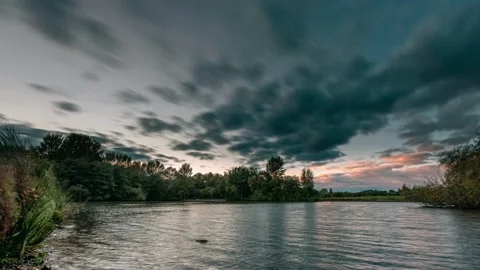 Sky on fire over lake Stock Footage 143086938