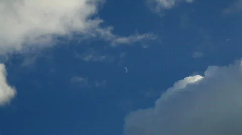 Sky with fluffy clouds &amp; moon Stock Footage 744631