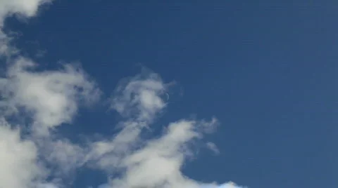 Sky with fluffy clouds &amp; moon Stock Footage 744850