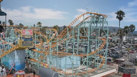 Sky Glider Above Wave Rider at Santa Cruz Beach Boardwalk Stock Footage 340075790