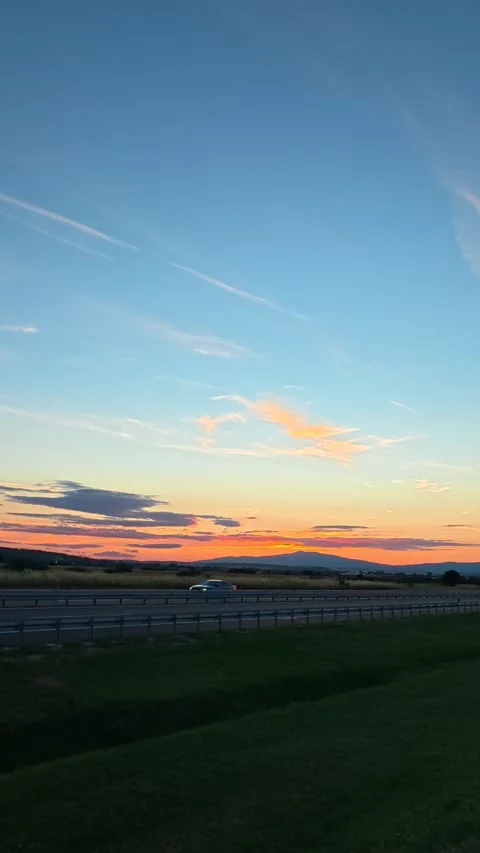 Sky glows orange, fading to deep blue. Serbia, Vertical Stock Footage 340652383