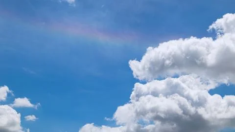 The sky had light clouds and rainbows. Stock Photos