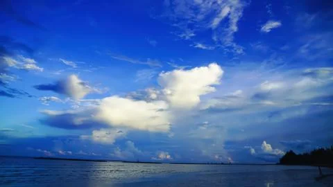 The sky has the light of the sun, the sky is blue, there are small and larg.. Stock Photos