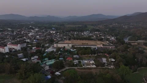 Sky-high sunset perspective of Pai village Stock Footage 302280320