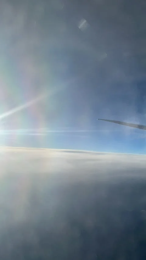 Sky High Timelapse: Clouds from the Plane Window Stock Footage 283053444