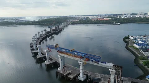 Sky-high view of RTS Link pathway cutting across the Johor Strait. Stock-Footage 315547396