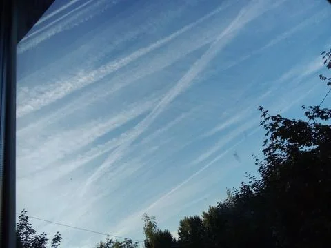 Sky in jet trails Stock Photos
