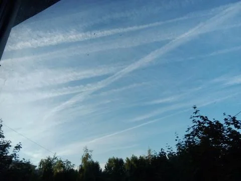 Sky in jet trails Stock Photos
