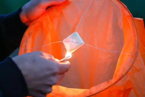 Sky lantern with burning fire. Blue sky. Close up Stock-Fotos