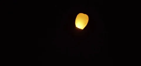 Sky lantern floating towards the sky at night 動画素材 73550713