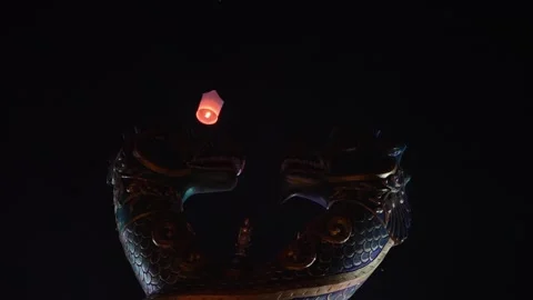 Sky Lanterns Floating Above Temple Guardian Statues Stock Footage 327704447