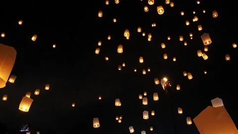 Sky lanterns, flying lanterns, floating lanterns in Loy Krathong Festival. Stock Footage 158968328