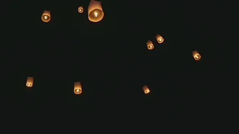 Sky lanterns, flying lanterns, floating lanterns, hot-air balloons. Stock Footage 319742559