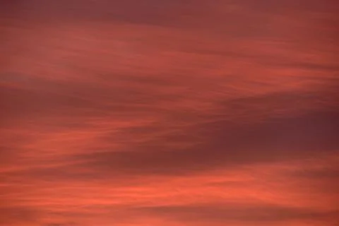 Sky light after sunset. orange background, clouds Stock Photos